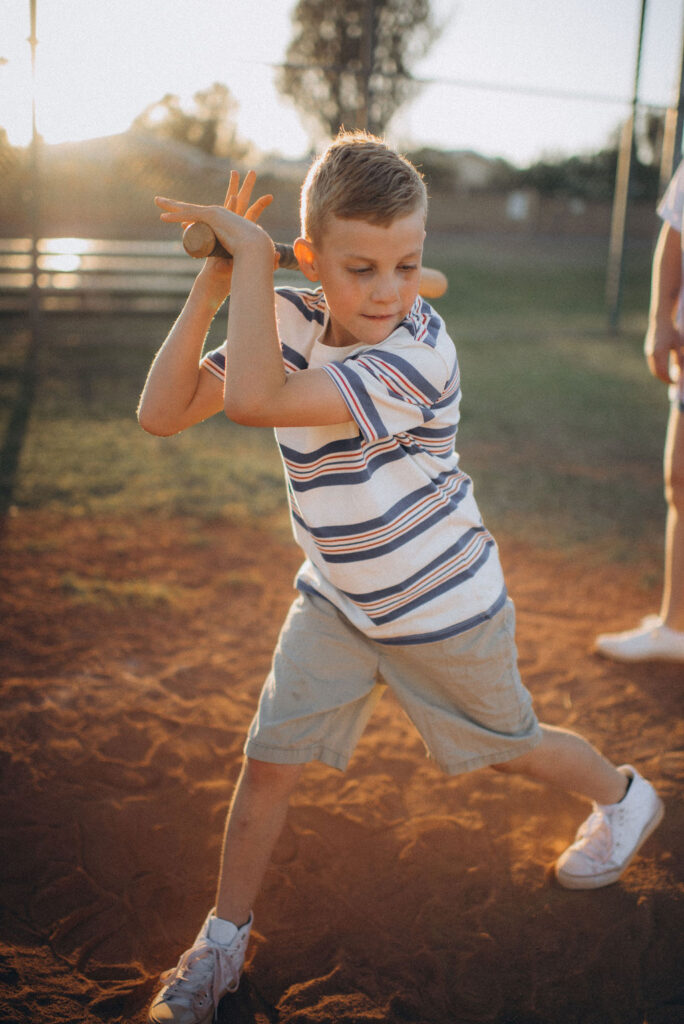kid up to bat for their storytelling photo session