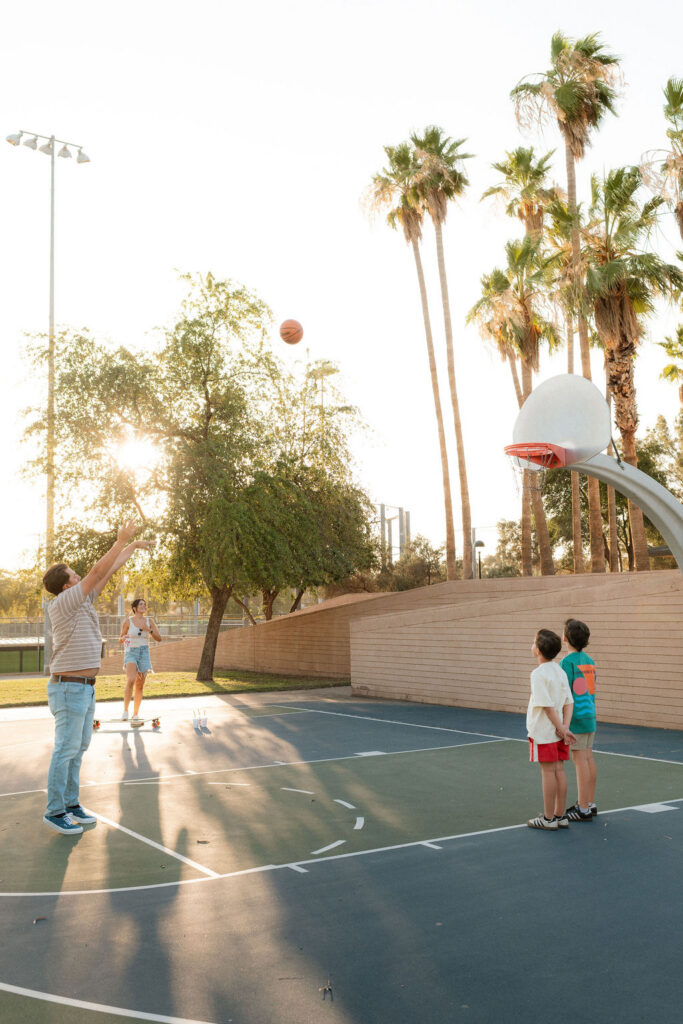 Phoenix family playing basketball for a candid photoshoot